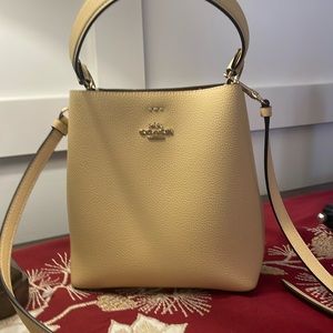 Coach Yellow pebbled leather cross body bag
